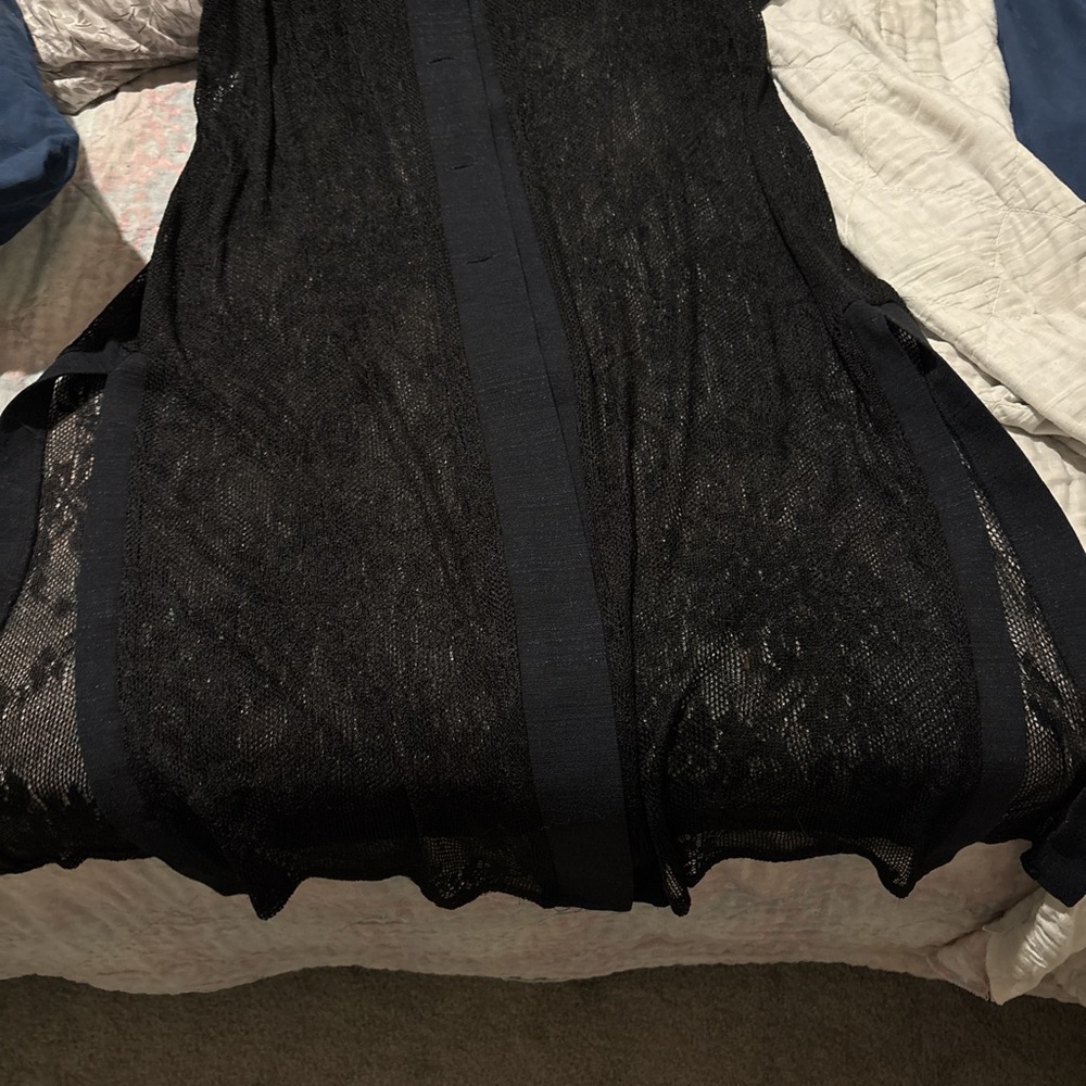 Mesh or lace cover-up or could be used as a dress